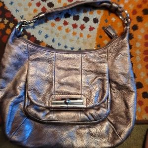 Coach metallic silver/bronze med sz purse. Has crossbody strap. $10 Real Leather